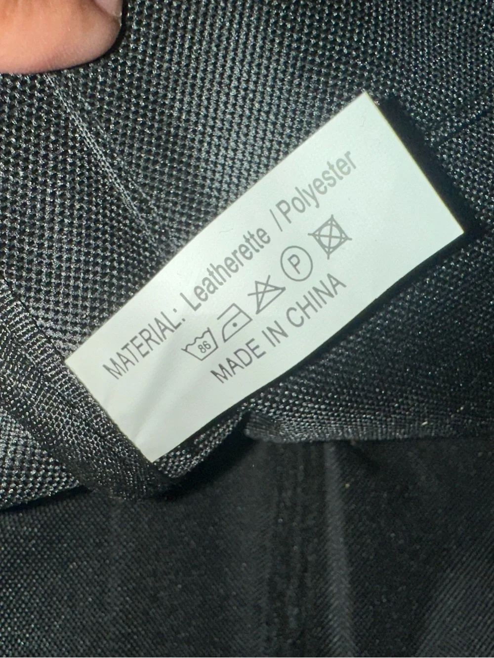 Journeyman Black Logo Checkered Print Leatherette Backpack